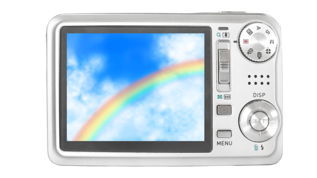 Silver early compact digital camera shown from the back with LCD screen